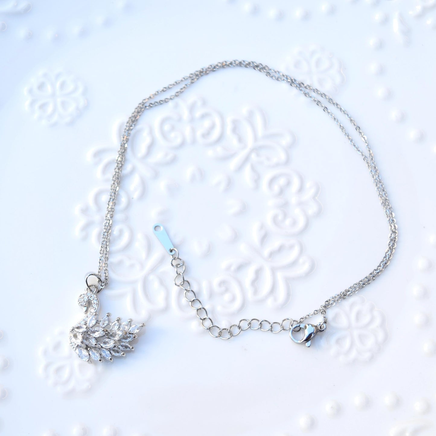 Silver White Crystal Charm Necklace: Perfume Bottle Swan Clover